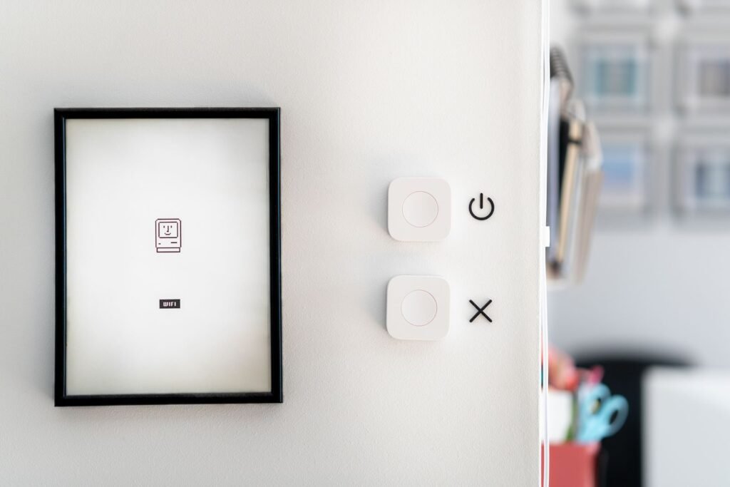 Photo by Jakub Zerdzicki Modern minimalist interior featuring smart home devices and framed art for contemporary design aesthetics.