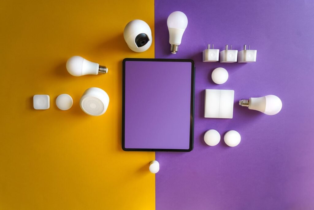 Innovative smart home gadgets arranged in a modern flat lay.