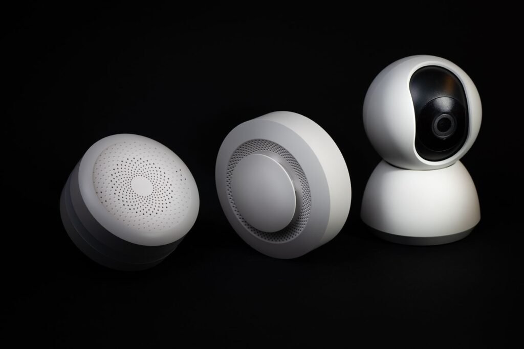 Elegant and innovative home automation devices on a sleek black background, showcasing modern technology.